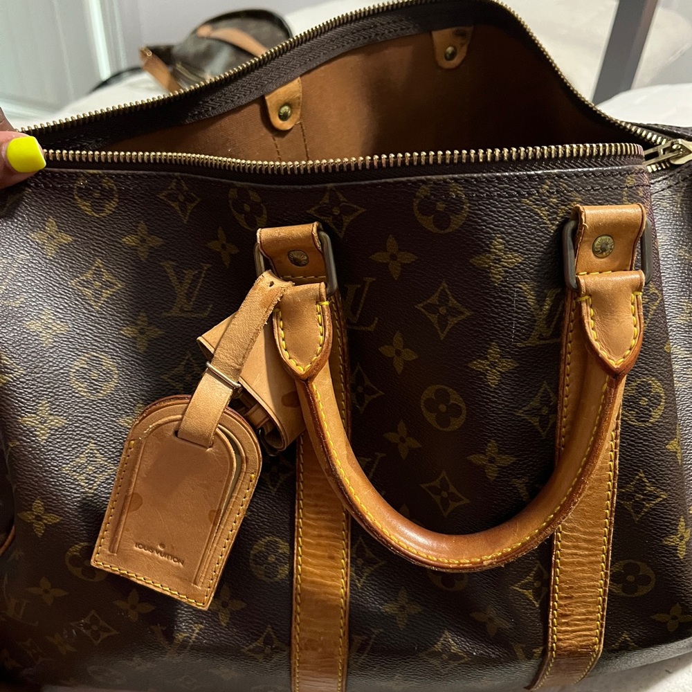 LOUIS VUITTON Vintage Keepall 55 Duffle Bag